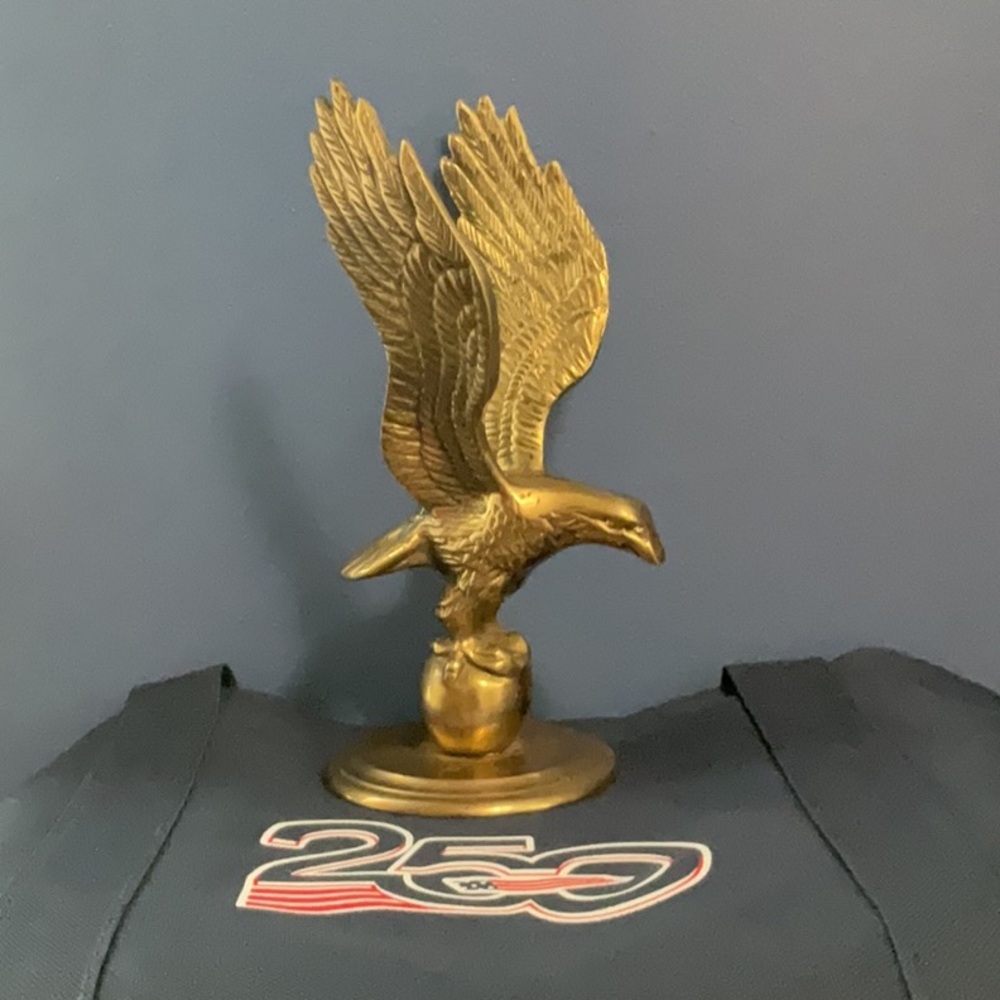 Brass Soaring Eagle Sculpture on ball pedestal symbolize- freedom and strength